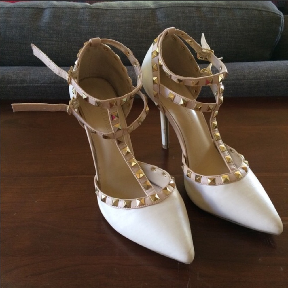 Fierce cream studded 3-3 1/2” heel.